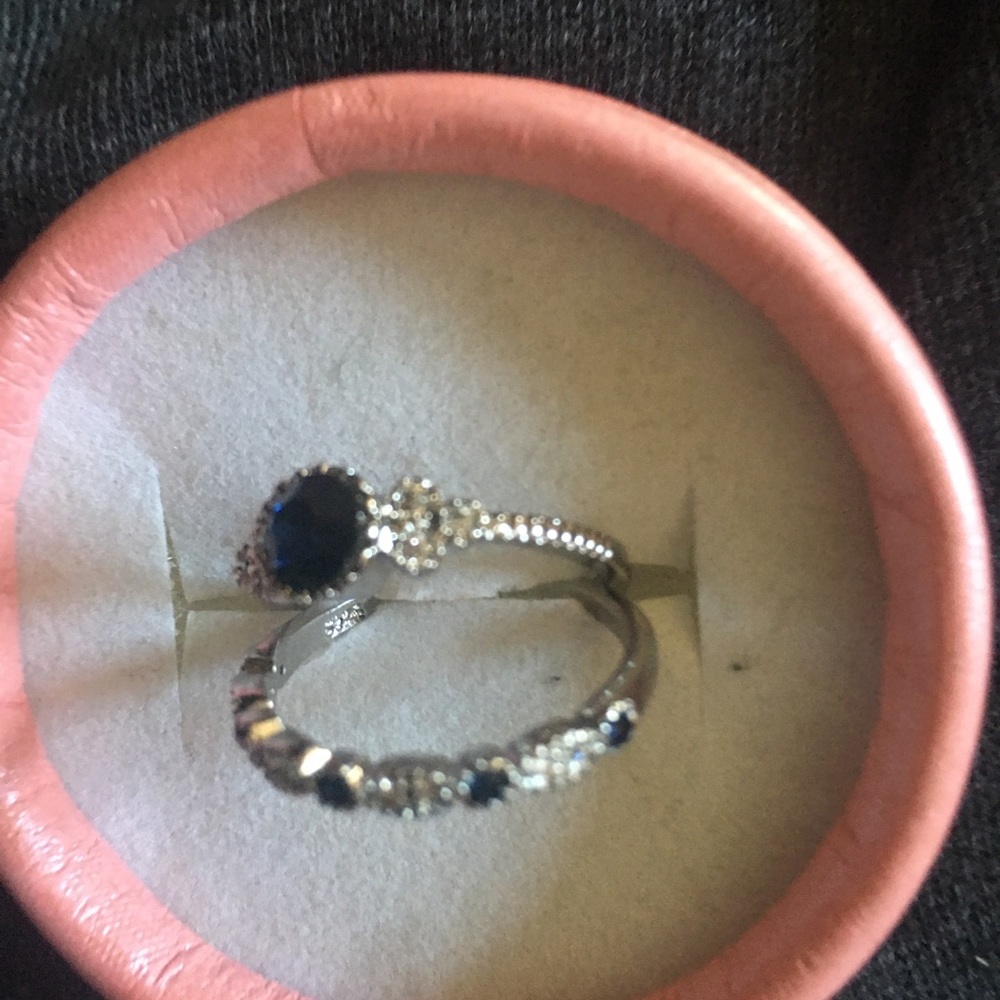 Silver plated size 7 with blue stones set of rings